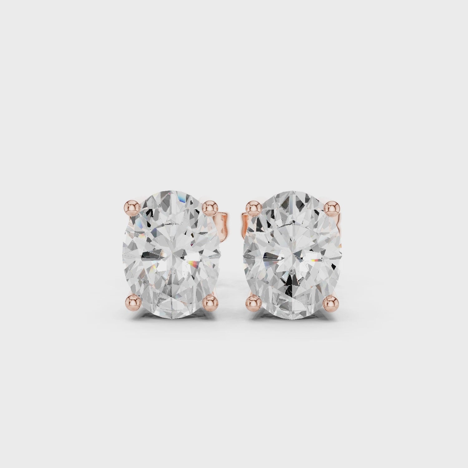 Oval Cut Diamond Stud Earrings