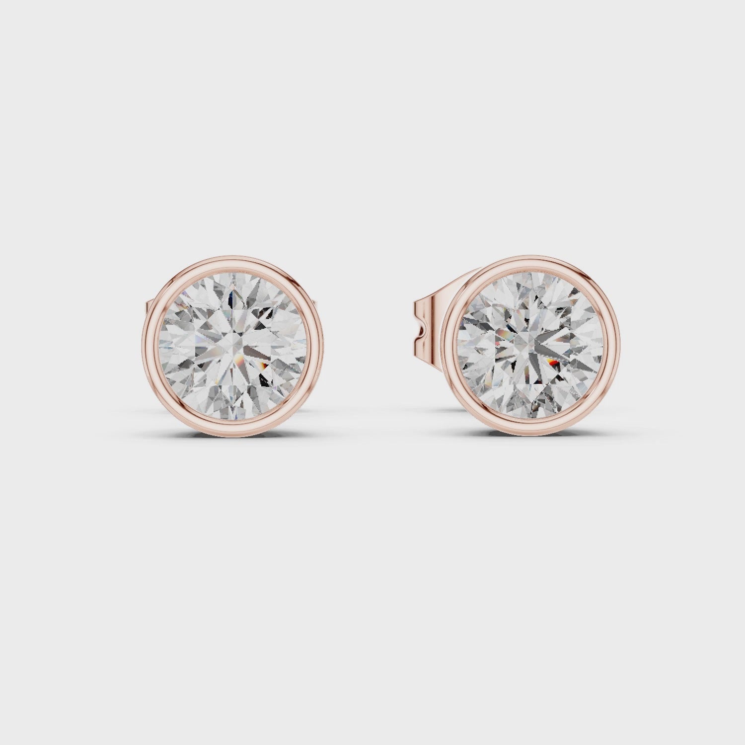 Round Cut Bezel Diamond Stud Earrings
